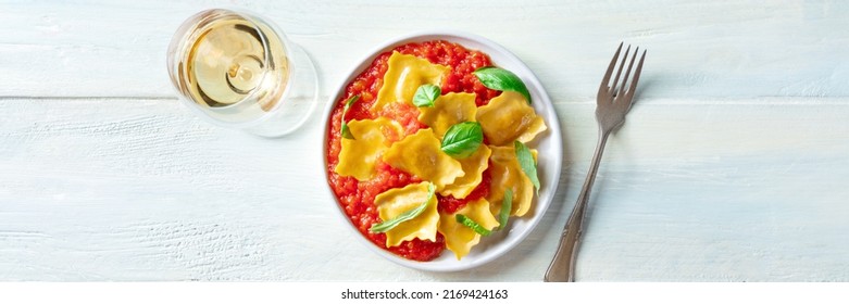 Ravioli With Tomato Sauce And Basil With A Glass Of White Wine, A Panorama For An Italian Restaurant Menu, Overhead Flat Lay Shot