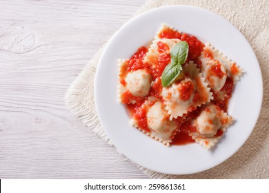 Ravioli With Tomato Sauce On A Plate. Horizontal View From Above
