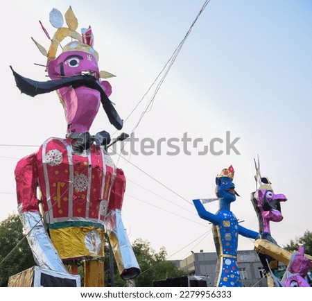 Ravnans being ignited during Dussera festival at ramleela ground in Delhi, India, Big statue of Ravana to get fire during the Fair of Dussera to celebrate the victory of truth by Lord Rama