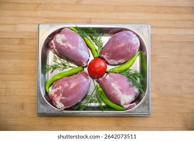 Raw assorted Azerbaijani kebabs prepared for grilling. Traditional minced and marinated meat skewers, ready for barbecue. Authentic Caucasus cuisine with lamb, beef, and chicken varieties.