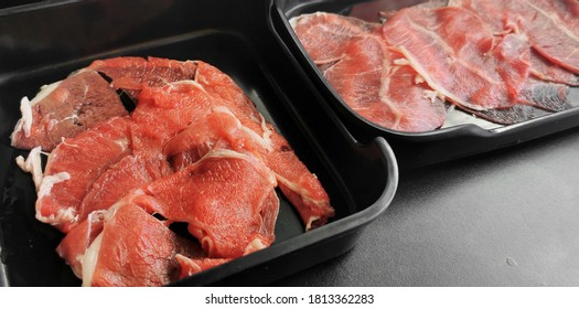 Raw Beef In Dish For Sukiyaki, Shabu Shabu, Thin Sliced Beef.