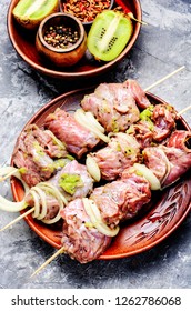 Raw Beef Kebab In Kiwi Marinade.Bbq Meat On Wooden Skewers