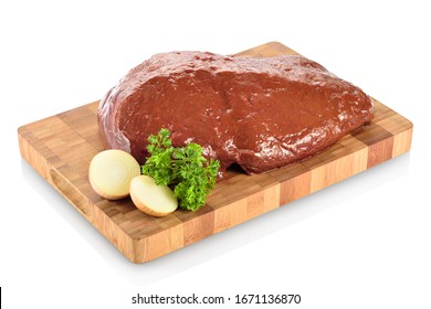 Raw Beef Liver, Ready To Be Cooked. On A Cutting Board With Chopped Onions And Parsley Aside. Isolated On White Background.