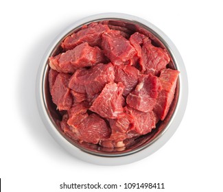 Raw Beef Meal In Bowl, Fresh, Natural Food For Dog Or Cat, Isolated On White Background. Top View.