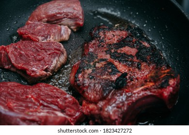 Raw Beef Meat For Cooking Steak. Cooking Rib Eye Steak In A Frying Pan At A Cooking Class. Burnt Steak. Cooking At Home, Home-made Food.