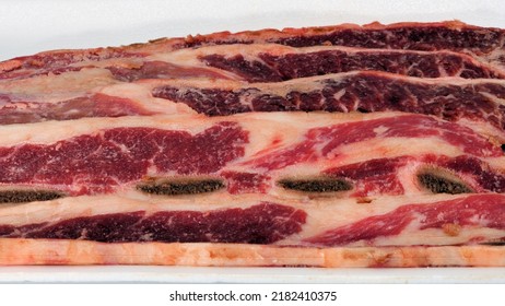 Raw Beef Rib Tips Close Up.