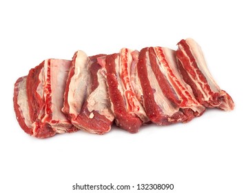 raw beef ribs on a white background