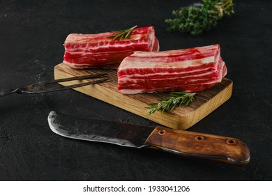 Raw Beef Short Ribs, Bone In On Dark Background