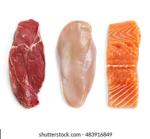 Raw Beef Steak, Chicken Breast, And Salmon, Isolated On White.  Top View.  Lean Proteins.