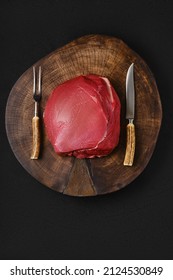 Raw Beef Top Round Meat, Whole Uncut Section On Wooden Slab