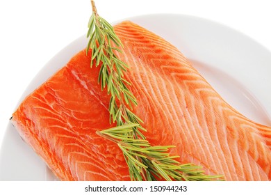 Raw Big Salmon Bar On White Plate And Rosemary