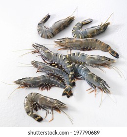 Raw Black Tiger Prawns On A White Background