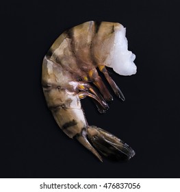 Raw Black Tiger Shrimp On Black Background

