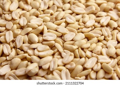 Raw blanched peanuts as food background closeup - Shutterstock ID 2111322704