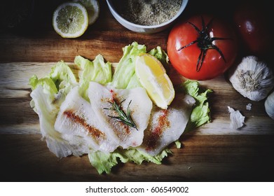 Raw Bluegill Fish Fillet Seasoned With Garlic, Rosemary, Season Salt And A Hint Of Lemon