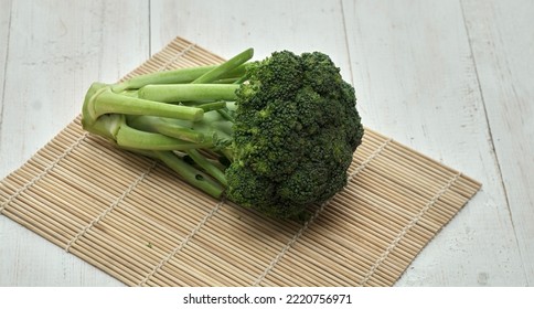 Raw Brocoli, Raw Brocoli Isolated On White Wood Background.