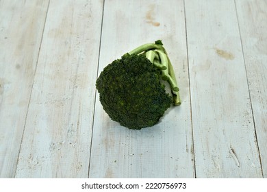 Raw Brocoli, Raw Brocoli Isolated On White Wood Background.