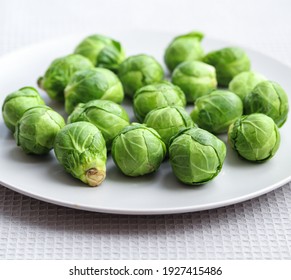 raw brussels sprouts on a plate