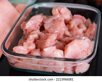 Raw Chicken Breast Slices In A Glass Baking Tray