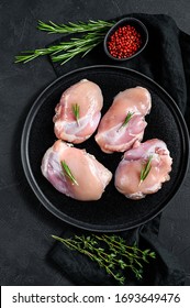 Raw Chicken Drumstick Fillet Without Skin. Farm Poultry Meat. Black Background. Top View