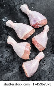 Raw Chicken Drumsticks , Legs. Organic Poultry Meat. Black Background. Top View