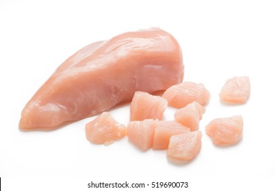 Raw Chicken Fillet. Small Pieces Of Meat Isolated On White.