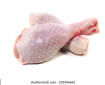 Raw Chicken Legs On A White Background