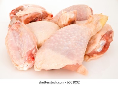 Raw Chicken  Pieces On White Background