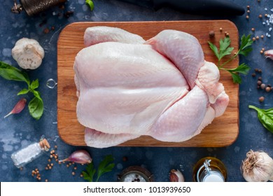Raw chicken for a recipe, top view, horizontal - Shutterstock ID 1013939650