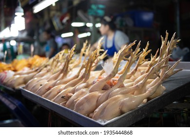 Raw Chicken Sold At Food Stall At Khlong Toei Wet Market In Bangkok, Thailand 