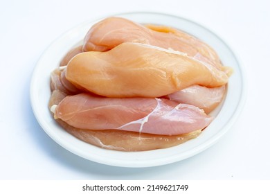 Raw Chicken Tenders On White Background.