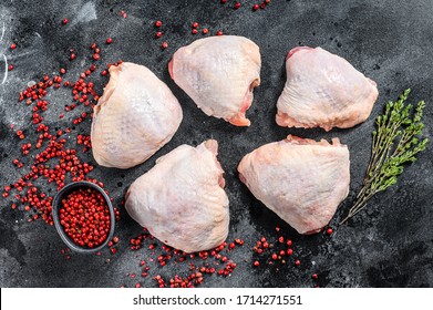 Raw Chicken Thigh With Skin, Organic Meat. Black Background. Top View