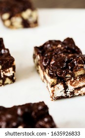 Raw Chocolate Hazelnut Cake Slices On White Marble Background. Selective Focus