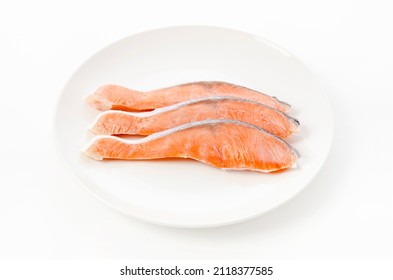 Raw Coho Salmon Fillet On White Plate