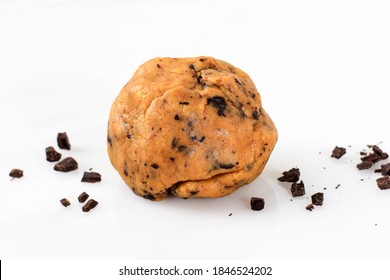 Raw Cookie Dough With Chopped Dark Cooking Chocolate Isolated On White Background