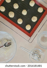 Raw Cookie Dough, Spoon, Beater Whisks And Glass Bowls