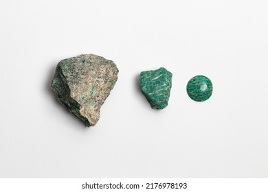 Raw, cut and polished Amazonite stone specimens on White Background. Mineralogy collection samples - Shutterstock ID 2176978193