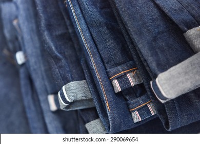 Raw denim jeans texture and close up, Dark blue jeans.
