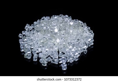 Raw Diamonds Isolated On Black Background.