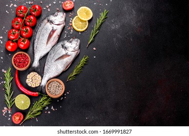 Raw Dorado Fish With Spices Cooking On Cutting Board. Fresh Fish Dorado