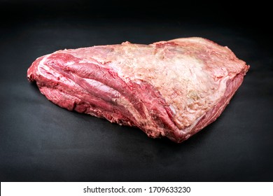 Raw dry aged wagyu beef shoulder clod roast as closeup on black background with copy space  - Shutterstock ID 1709633230