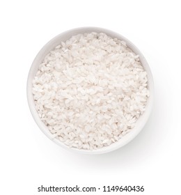 Raw dry rice in bowl isolated on white background, top view. Main asian food ingredient