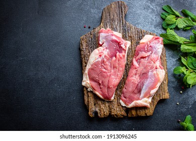 Raw Duck Breast Meat Poultry And Spices Barbecue Grill Fresh Portion On The Table Meal Snack Top View Copy Space For Text Food Background Rustic Image 