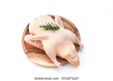 Raw duck isolated on white background, Fresh duck meat on wooden tray for food, Whole duck