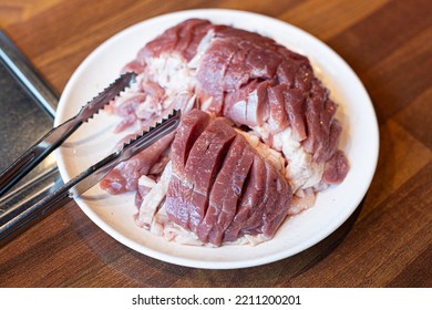 Raw Duck Meat Pieces With White Plate Isolated