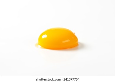 Raw Egg Yolk On White Background