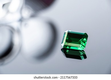 Raw Emeralds, Gemstone Jewelry On Black Background