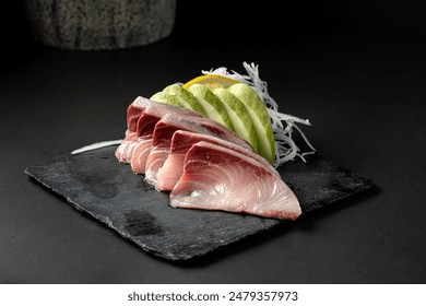 Raw fish with fresh cut served as sushi on a black background - Powered by Shutterstock