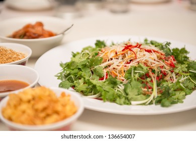 Raw Fish Salad (also Known As Yu Sheng Or Lo Hei), A Chinese New