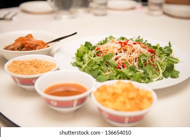 Raw Fish Salad (also Known As Yu Sheng Or Lo Hei), A Chinese New